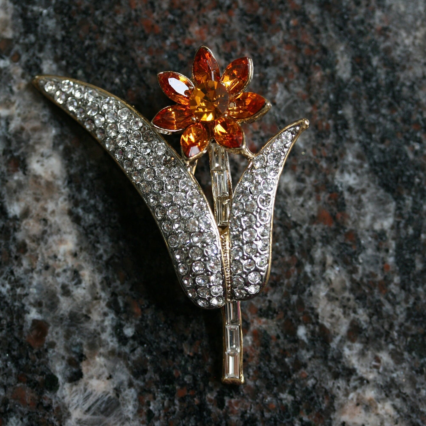 Pretty dainty vintage Topaz Tone /white Rhinestone Stemmed Flower Brooch