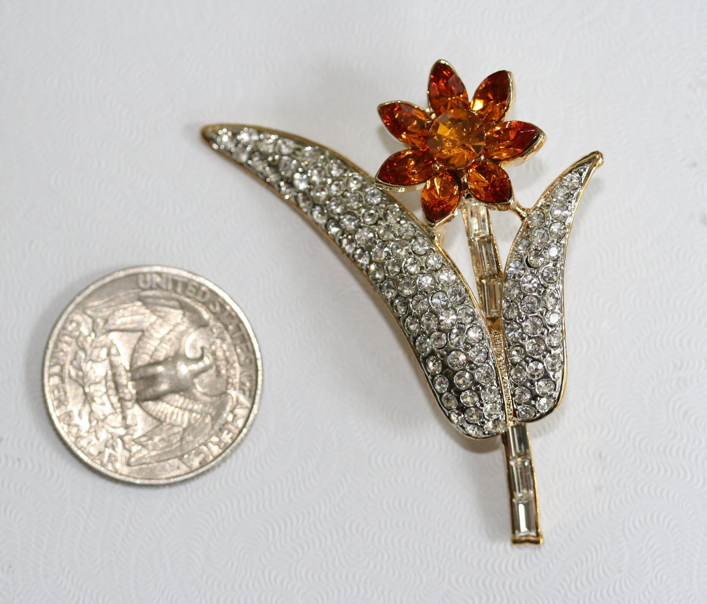 Pretty dainty vintage Topaz Tone /white Rhinestone Stemmed Flower Brooch